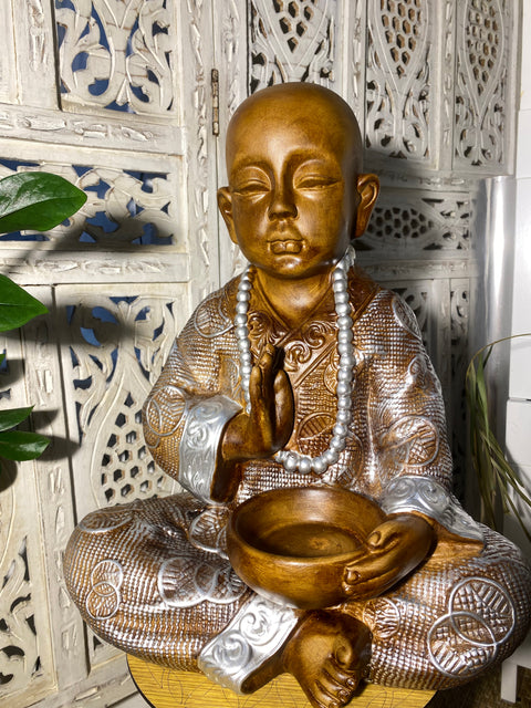 Bouddha avec assiette